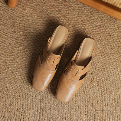 Mule in vera pelle con tacco basso