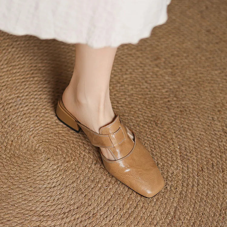 Mule in vera pelle con tacco basso