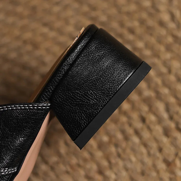 Mule in vera pelle con tacco basso