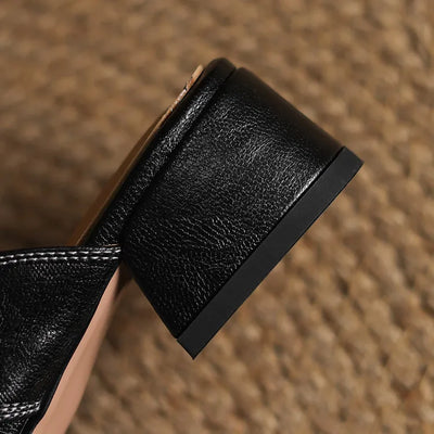 Mule in vera pelle con tacco basso